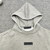 Felpa con cappuccio ESNTL Fear of God Grigio nebbia