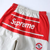 Pantaloni SPRM Racing bianchi