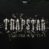 T-SHIRT CON LENTE ROTTATA