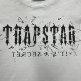 T-SHIRT CON LENTE ROTTATA