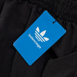 Pantaloncini BLNCG x Adidas con logo a trifoglio neri